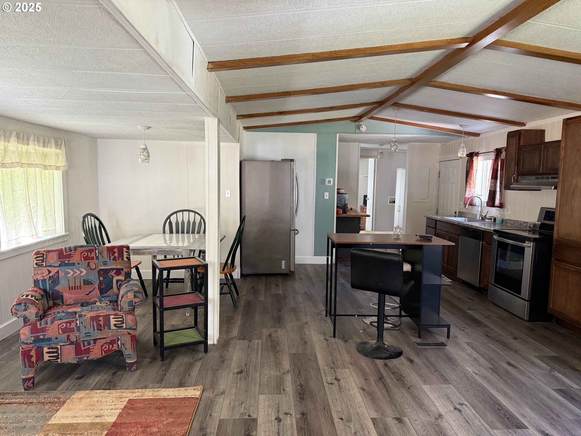 63615 East Birch Creek Road Pilot Rock, OR 97868 - Photo 11 of 15 a living room with furniture and a wooden floor