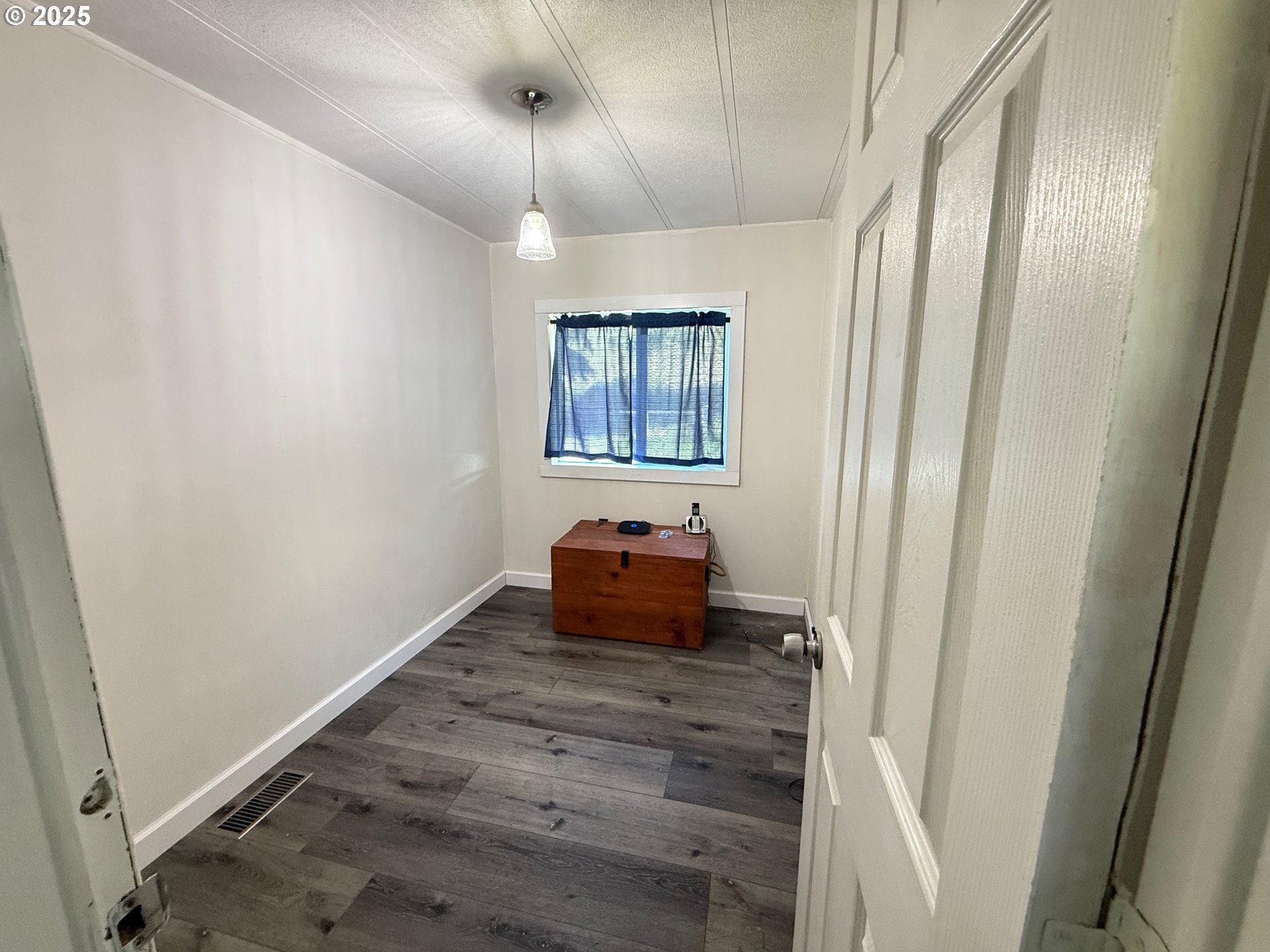 63615 East Birch Creek Road Pilot Rock, OR 97868 - Photo 7 of 15 wooden floor in an empty room and a window