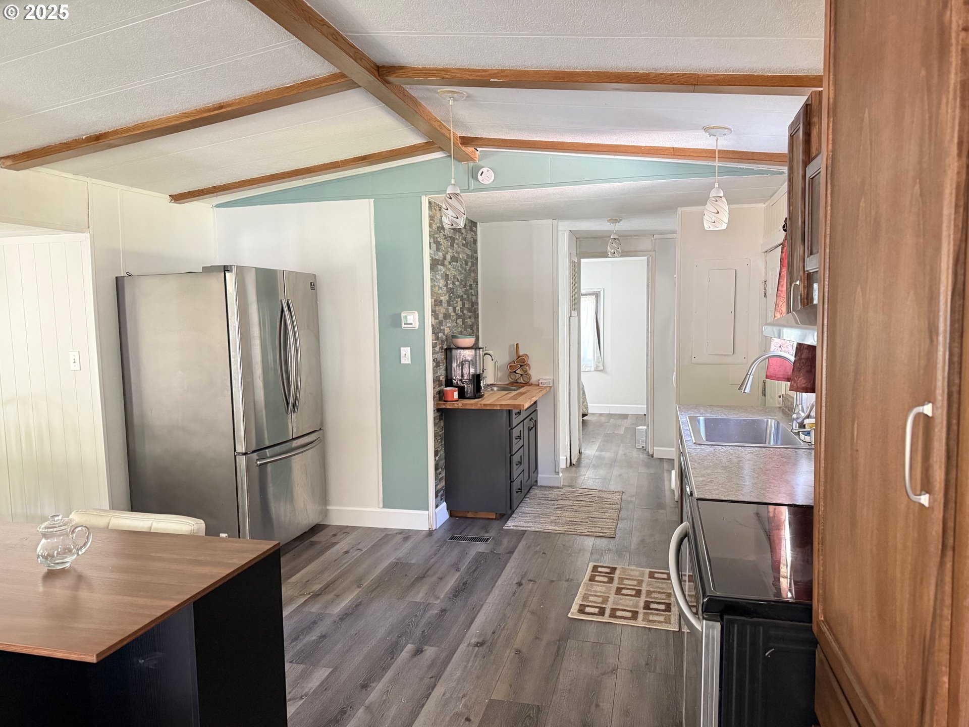 63615 East Birch Creek Road Pilot Rock, OR 97868 - Photo 10 of 15 a kitchen with a refrigerator and a sink