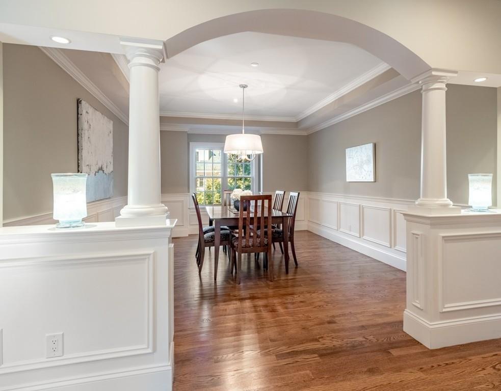 427 Lowell Road Concord, MA 01742 - Photo 12 of 35 a view of a dining room with furniture and wooden floor