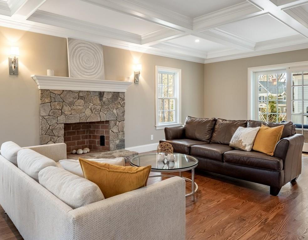 427 Lowell Road Concord, MA 01742 - Photo 14 of 35 a living room with furniture and a fireplace