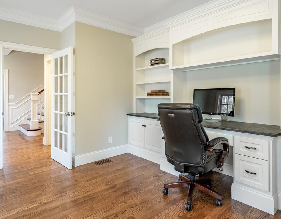 427 Lowell Road Concord, MA 01742 - Photo 16 of 35 a view of a workspace with furniture and a window