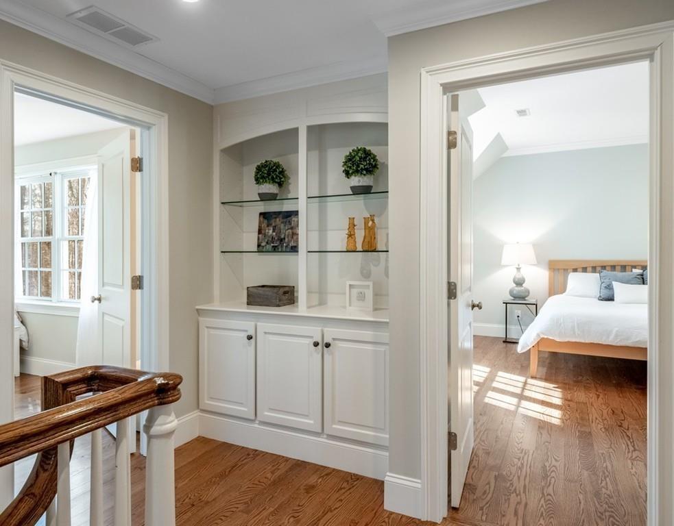427 Lowell Road Concord, MA 01742 - Photo 18 of 35 a view of a bedroom with wooden floor and bedroom