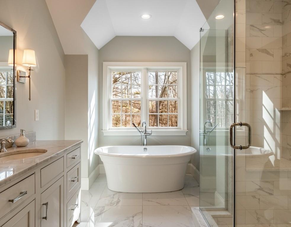 427 Lowell Road Concord, MA 01742 - Photo 20 of 35 a white bath tub sitting next to a white sink