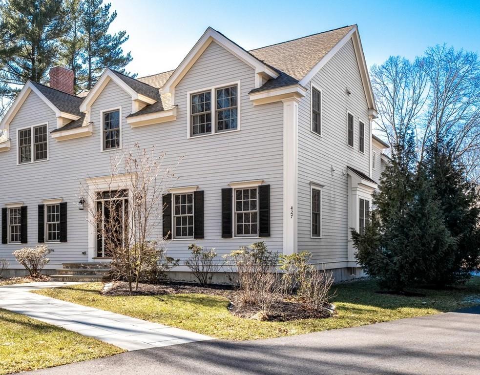 427 Lowell Road Concord, MA 01742 - Photo 2 of 35 a front view of a house with swimming pool