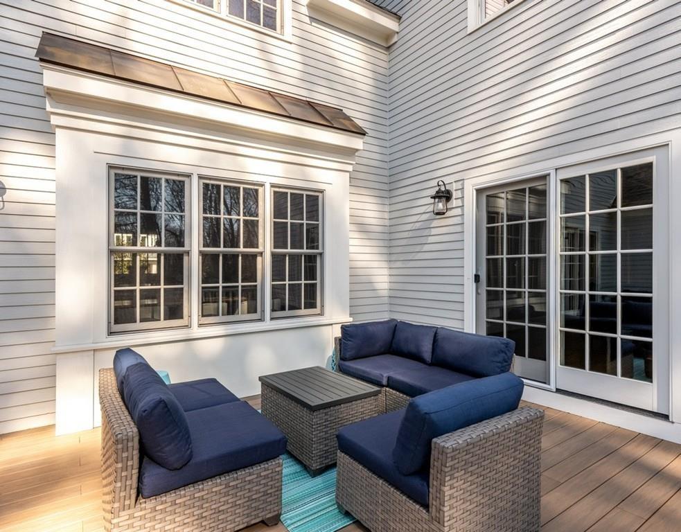 427 Lowell Road Concord, MA 01742 - Photo 32 of 35 a view of patio with a couch and a large window