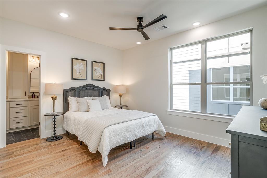 300 Foch Street, Unit 140 Fort Worth, TX 76107 - Photo 24 of 39 a bedroom with a large bed and a window