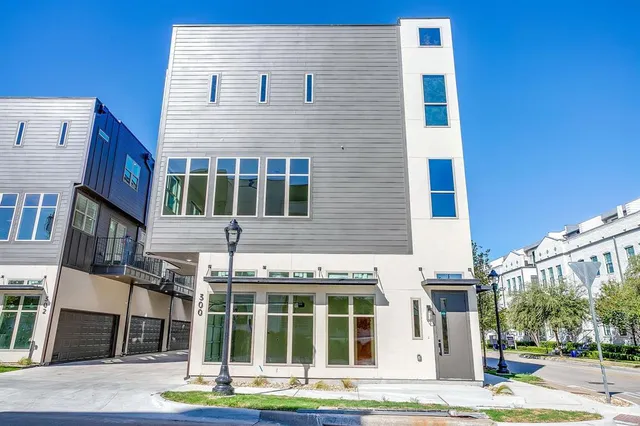 a front view of a building with street view