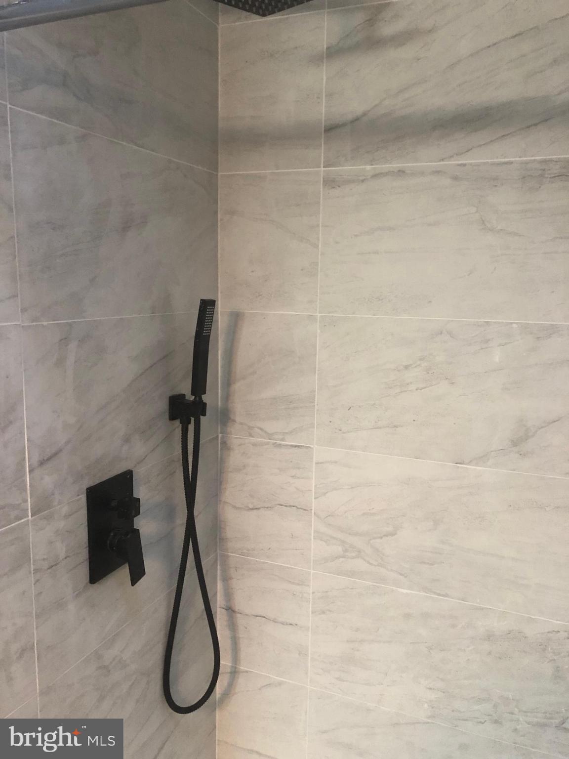 8550 Tolbut Street Philadelphia, PA 19152 - Photo 14 of 24 a bathroom with a shower