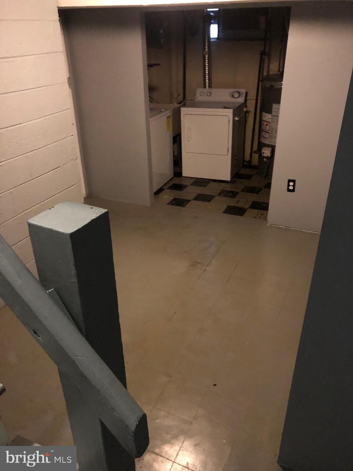 8550 Tolbut Street Philadelphia, PA 19152 - Photo 16 of 24 a view of storage and utility room with washer and dryer