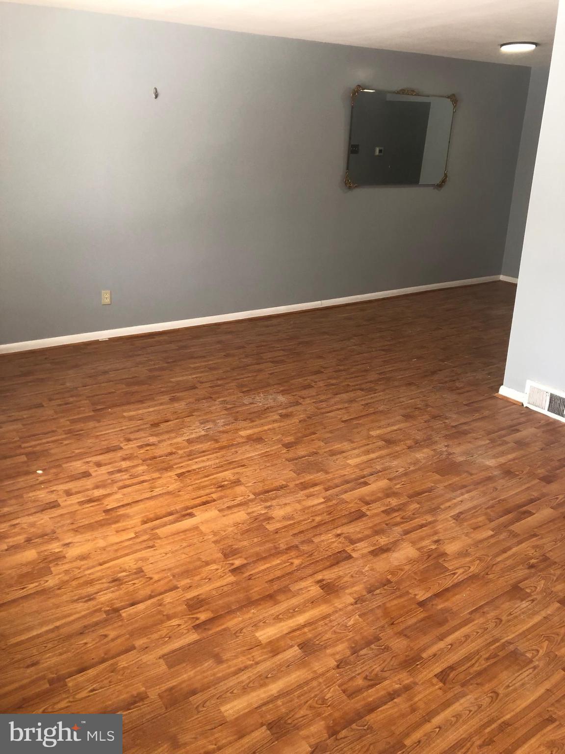 8550 Tolbut Street Philadelphia, PA 19152 - Photo 5 of 24 a view of empty room with wooden floor