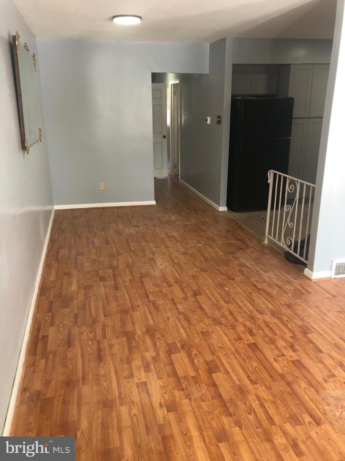 8550 Tolbut Street Philadelphia, PA 19152 - Photo 6 of 24 a view of empty room with wooden floor