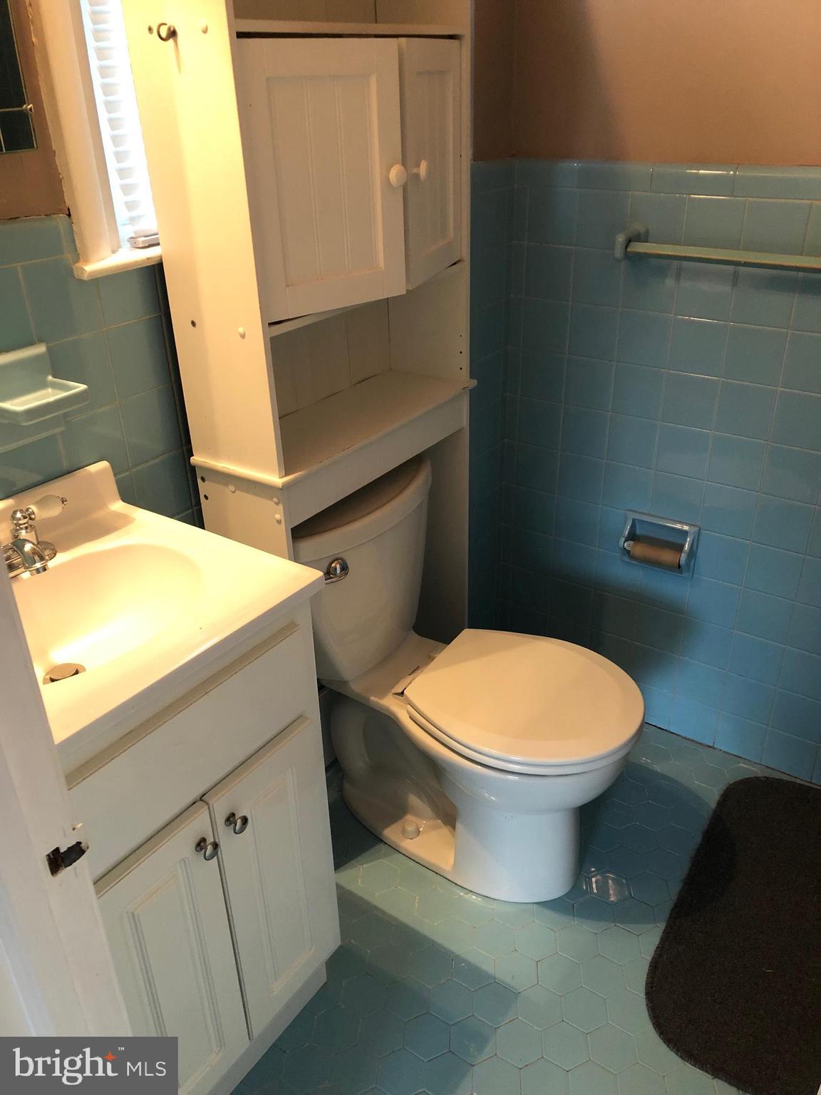 8550 Tolbut Street Philadelphia, PA 19152 - Photo 9 of 24 a bathroom with a sink and toilet