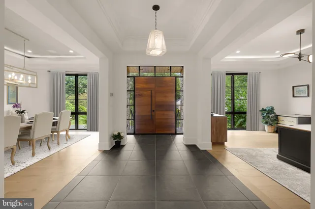 a view of a livingroom with furniture and a window