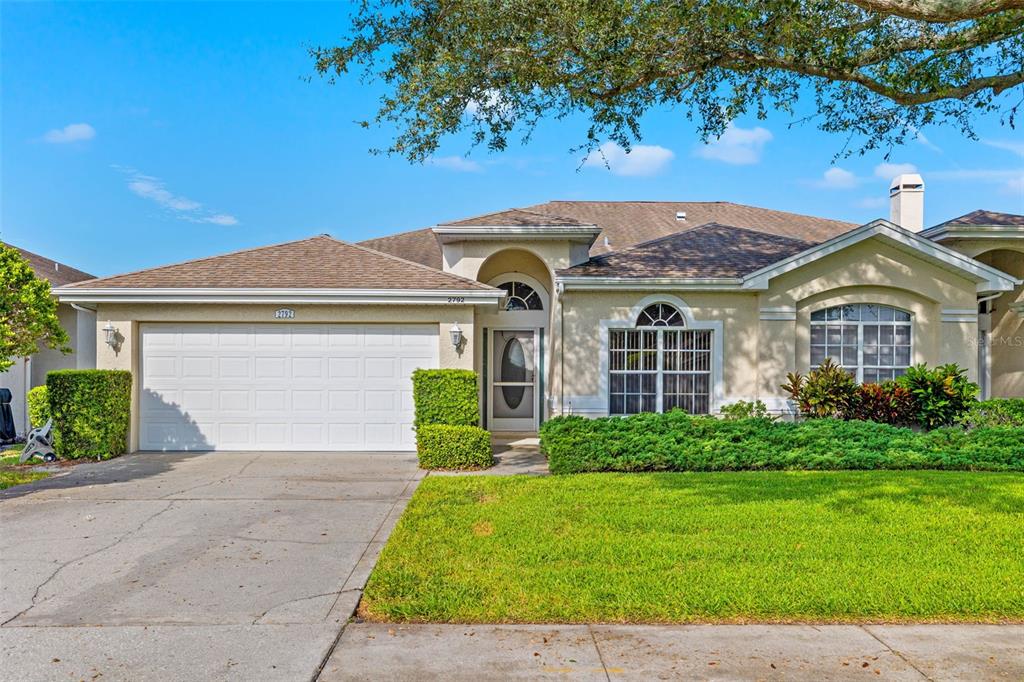 2792 Country Way Clearwater, FL 33763 - Photo 1 of 34 a front view of a house with a yard