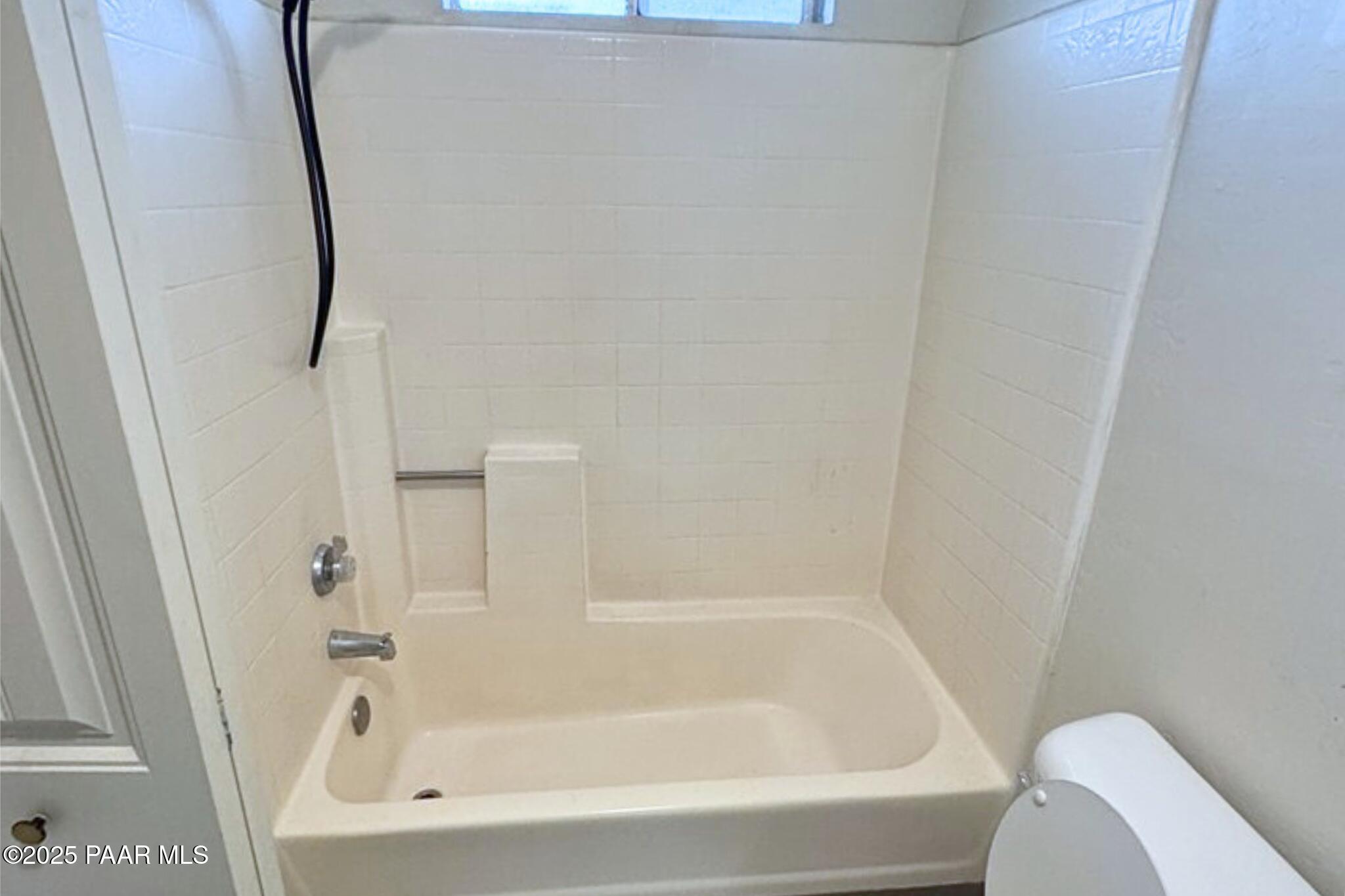 3184 North Tani Road, Unit 12 Prescott Valley, AZ 86314 - Photo 8 of 8 a close view of a bathtub in bathroom