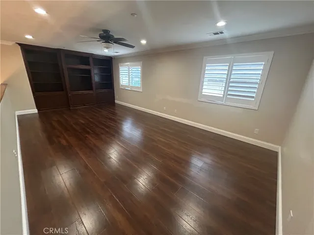 a view of swimming pool with a patio and a yard