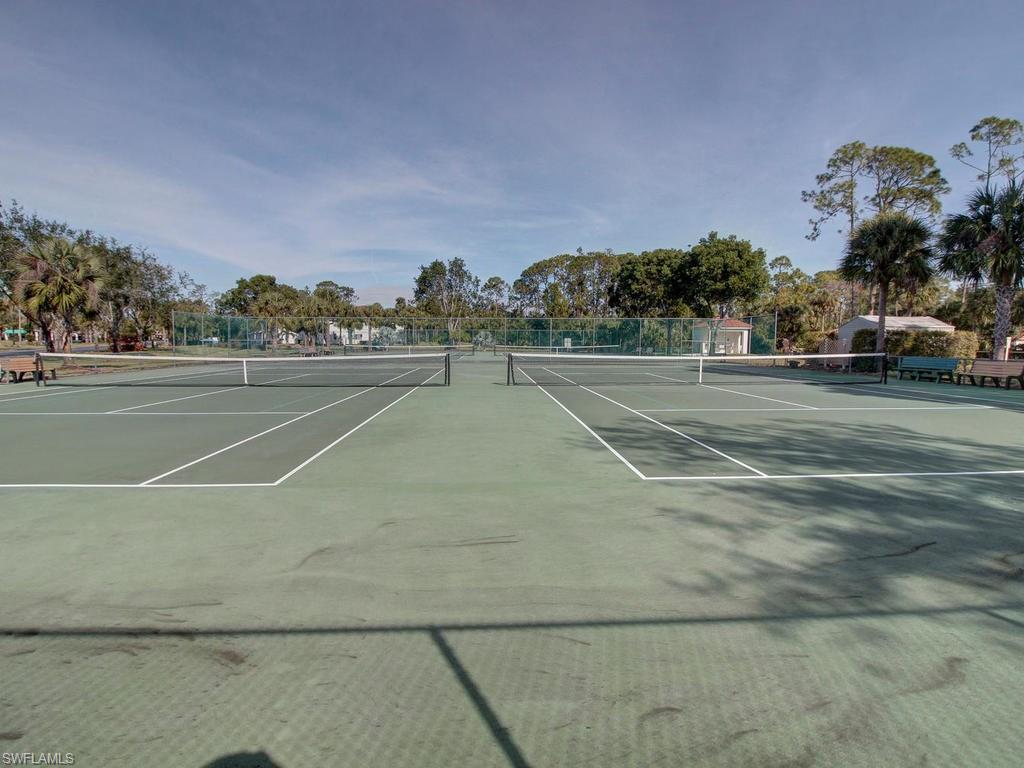 550 Gabriel Circle, Unit 3111 Naples, FL 34104 - Photo 3 of 25 a view of a tennis court