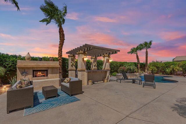 a view of a terrace with sitting area