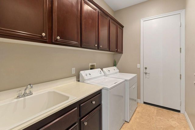 a utility room with a sink