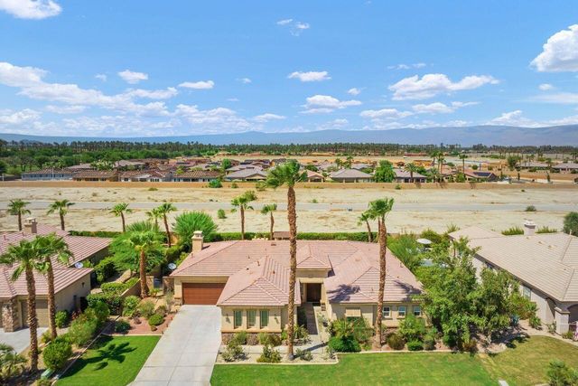 a view of a city with an ocean view