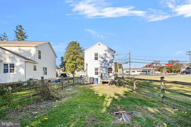 a large building with trees in front of it