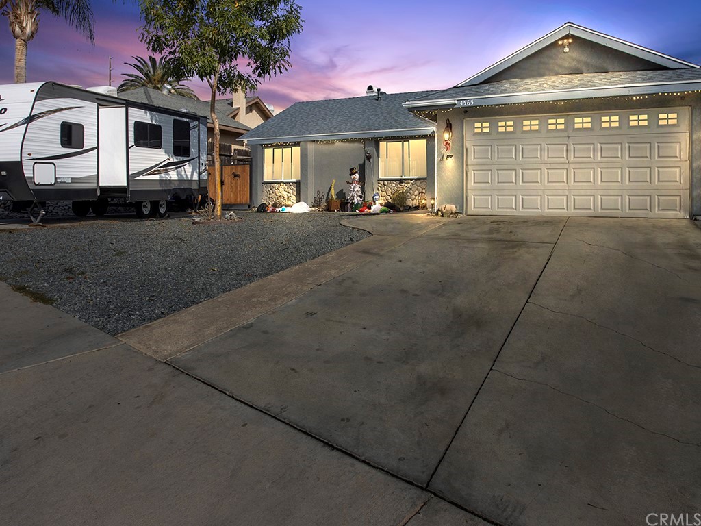 4565 Meredith Street Riverside, CA 92505 - Photo 1 of 1 a front view of a house with a yard