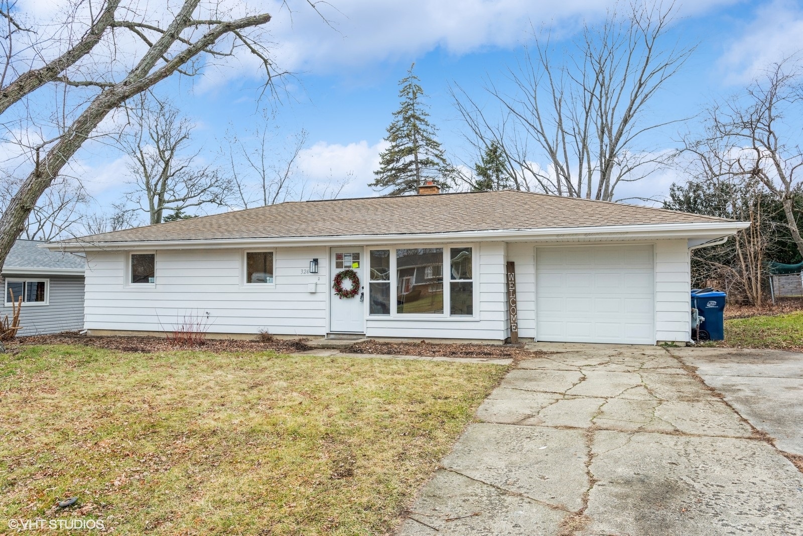 324 Springinsguth Road Schaumburg, IL 60193 - Photo 1 of 10 a front view of a house with a yard