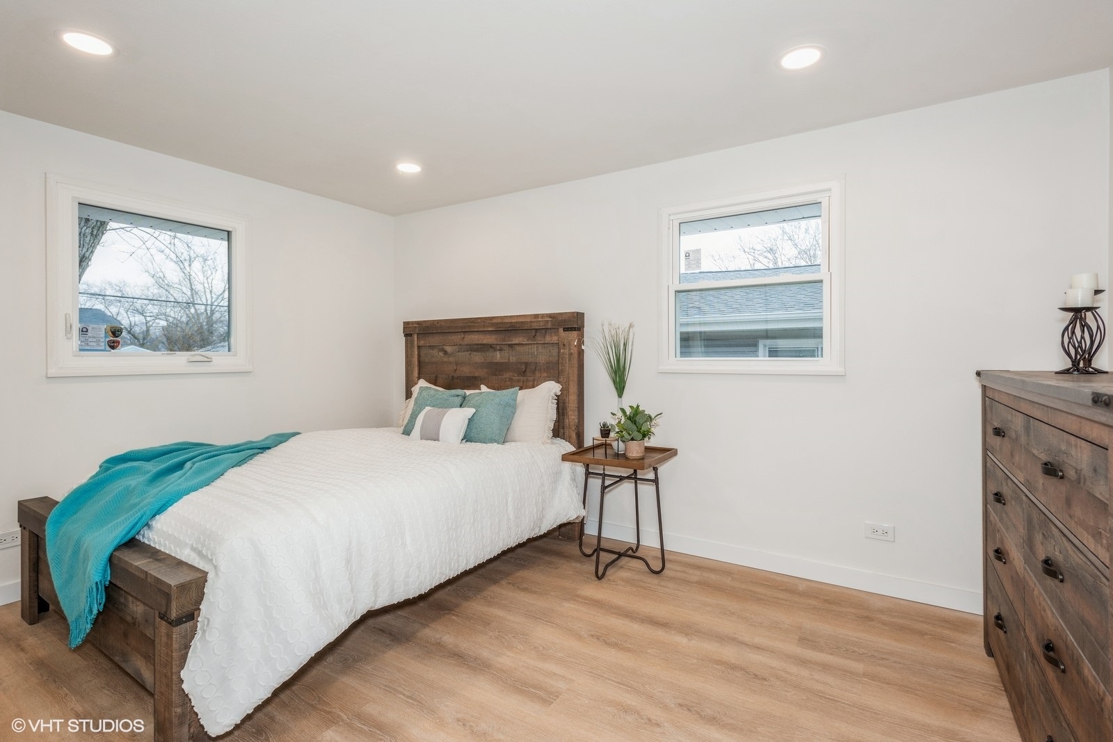 324 Springinsguth Road Schaumburg, IL 60193 - Photo 7 of 10 a bedroom with a bed and wooden floor