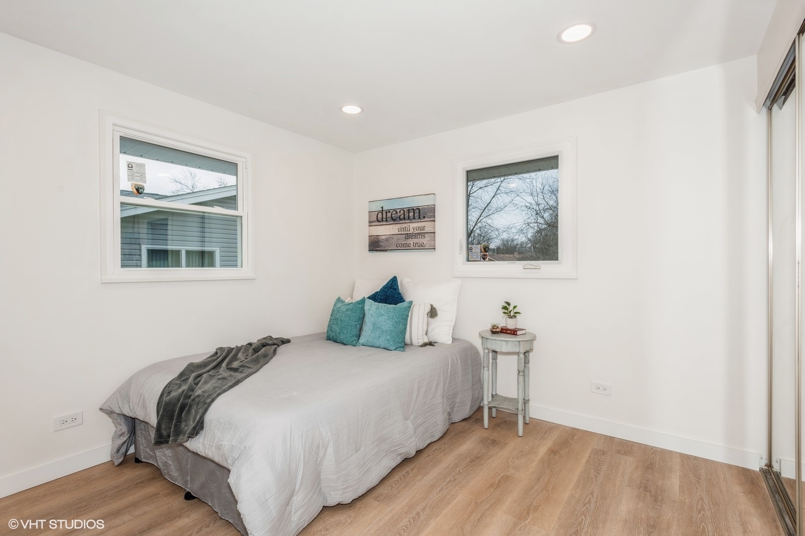 324 Springinsguth Road Schaumburg, IL 60193 - Photo 8 of 10 a bedroom with a bed and wooden floor