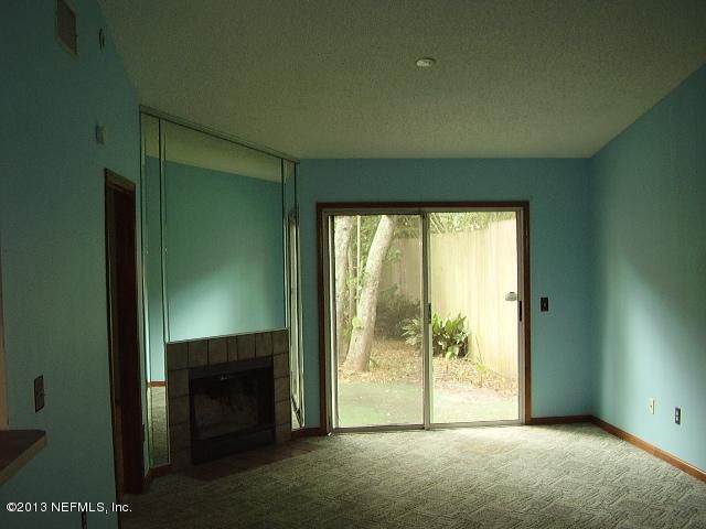 2465 Wattle Tree Road East Jacksonville, FL 32246 - Photo 5 of 11 a view of livingroom with front door