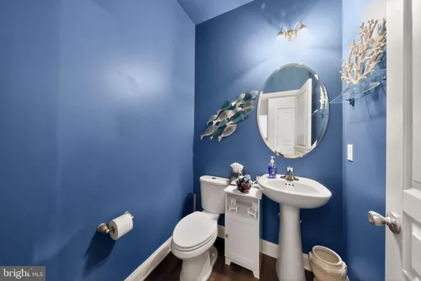 a utility room with a sink dryer and washer