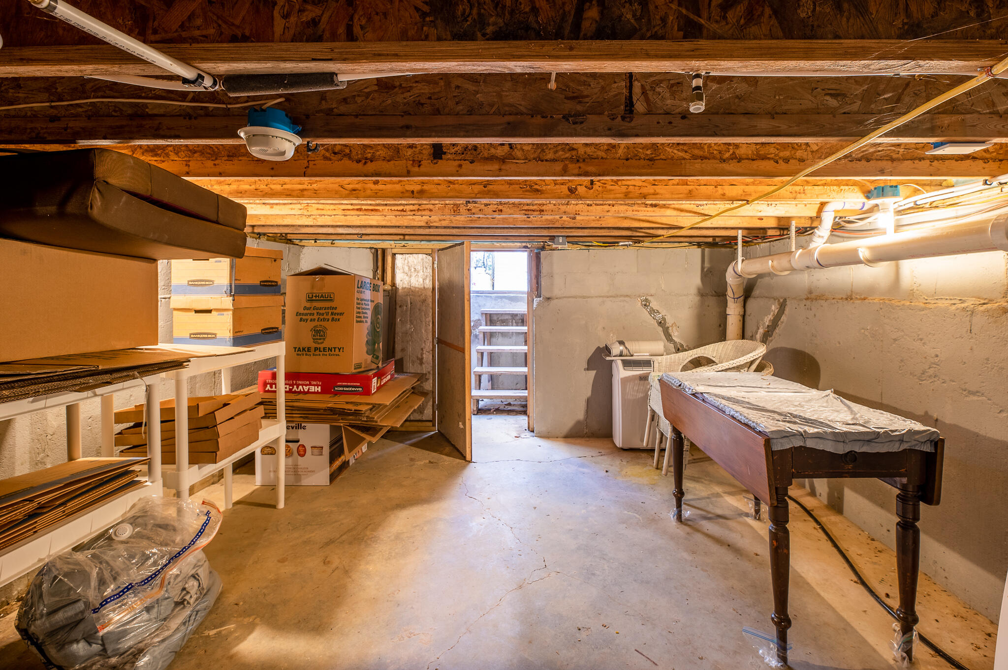 424 South Road Holden, ME 04429 - Photo 39 of 62 crawl space from opposite end of doors s
