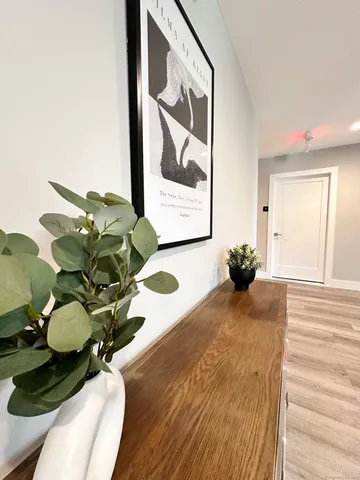 a vase of flowers sitting on a table
