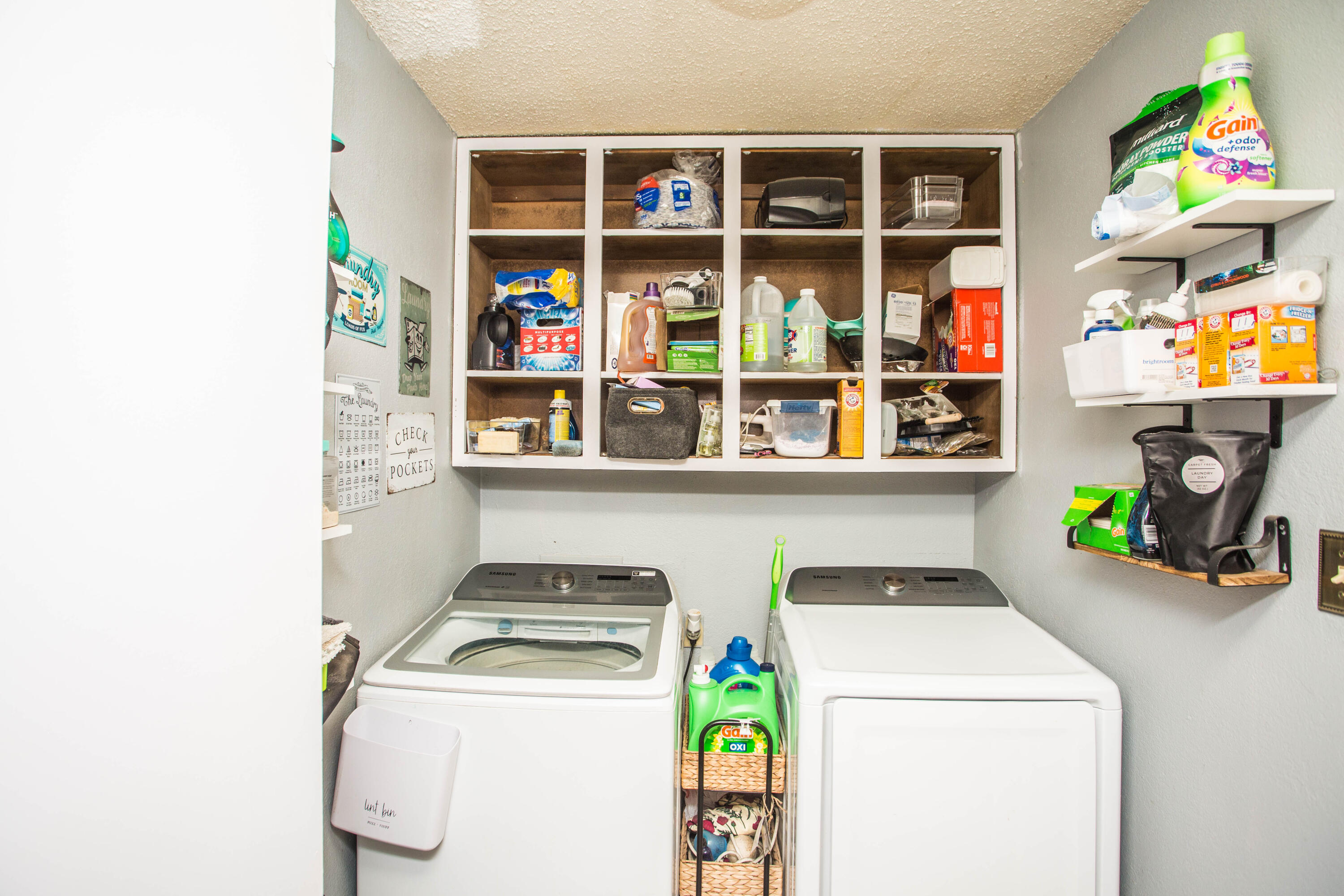 5202 44th Street Lubbock, TX 79414 - Photo 21 of 51 a utility room with dryer and washer