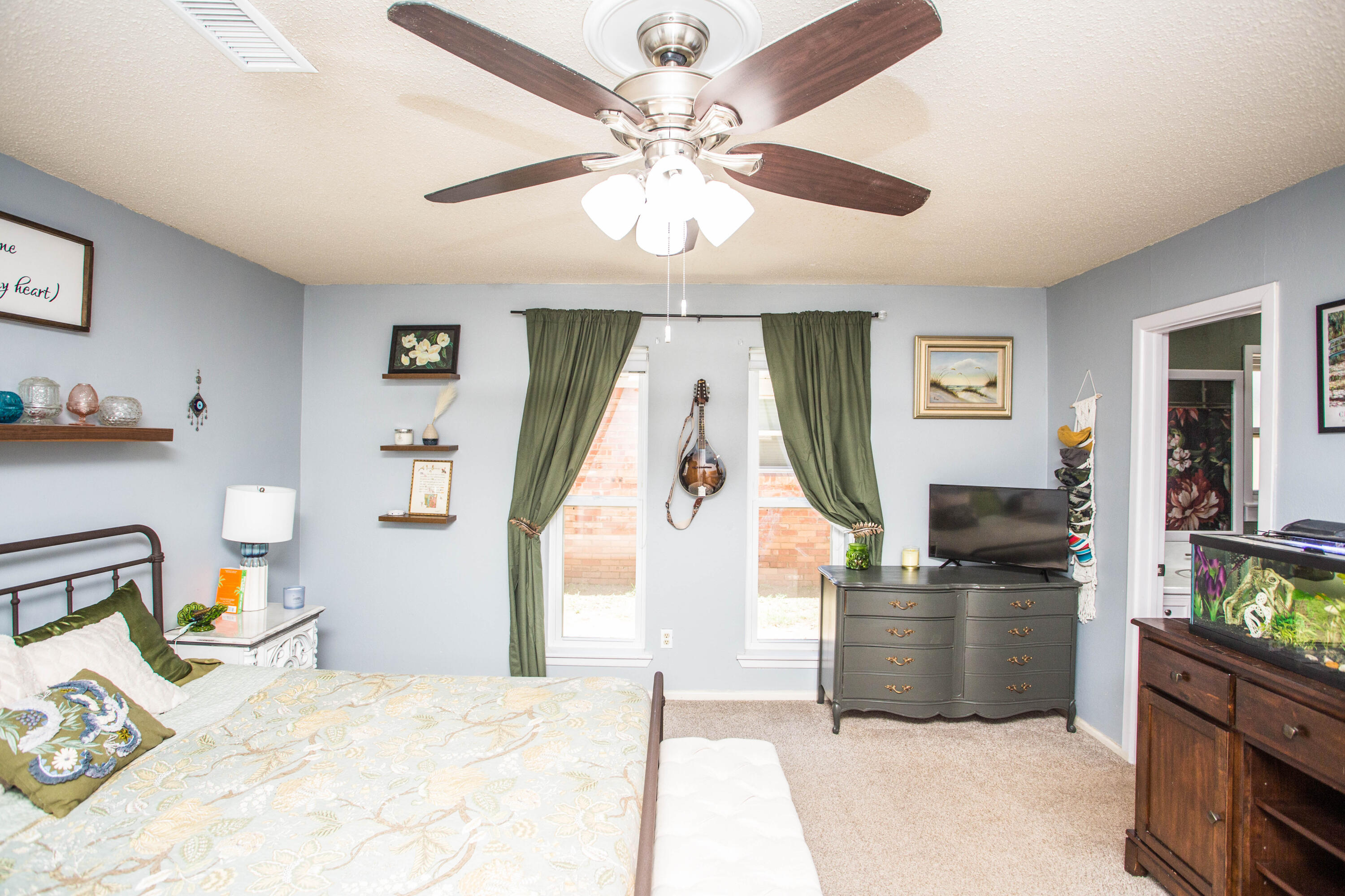 5202 44th Street Lubbock, TX 79414 - Photo 25 of 51 a very nice looking room with a large window