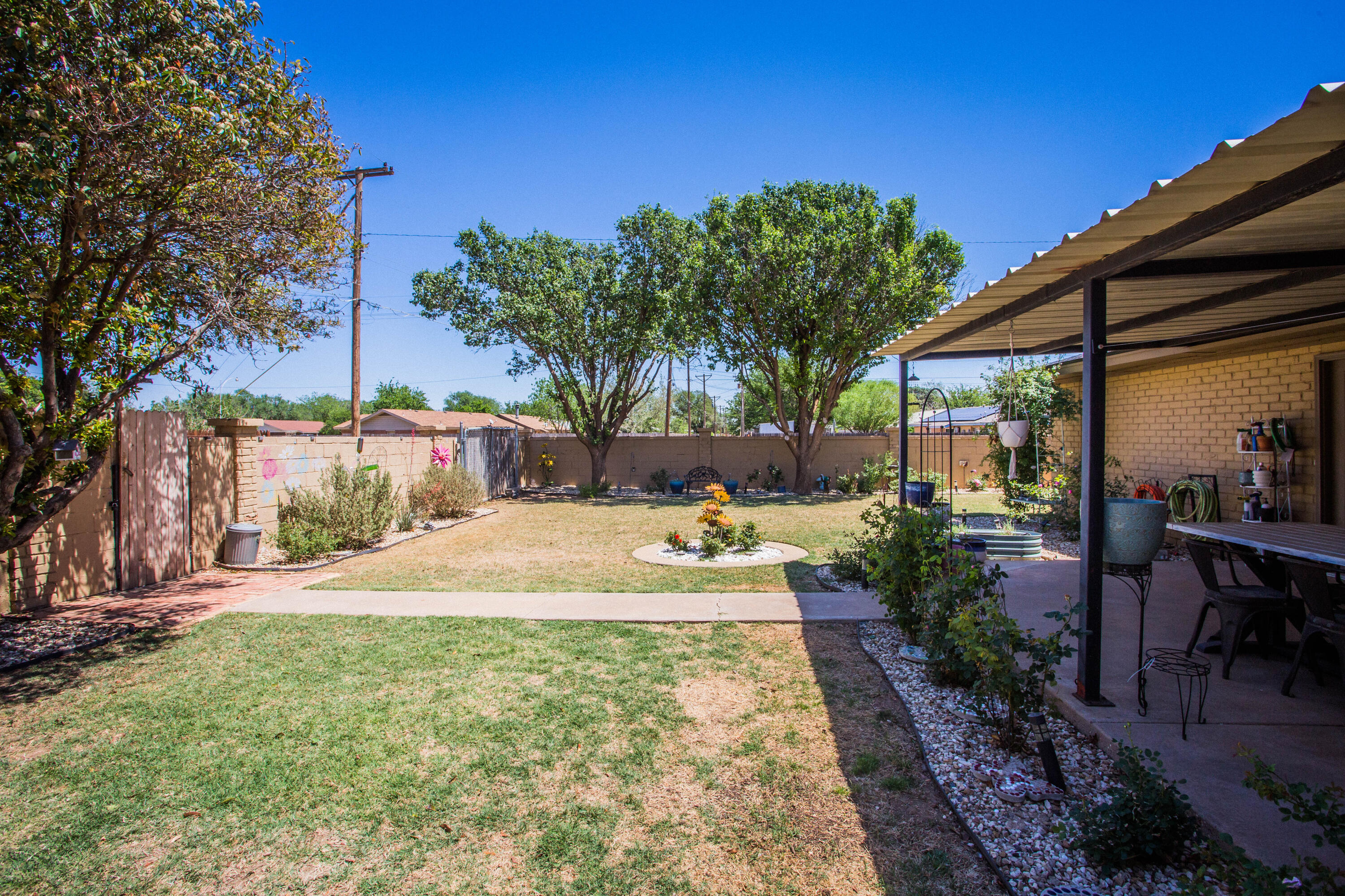 5202 44th Street Lubbock, TX 79414 - Photo 45 of 51 a view of a backyard with sitting area