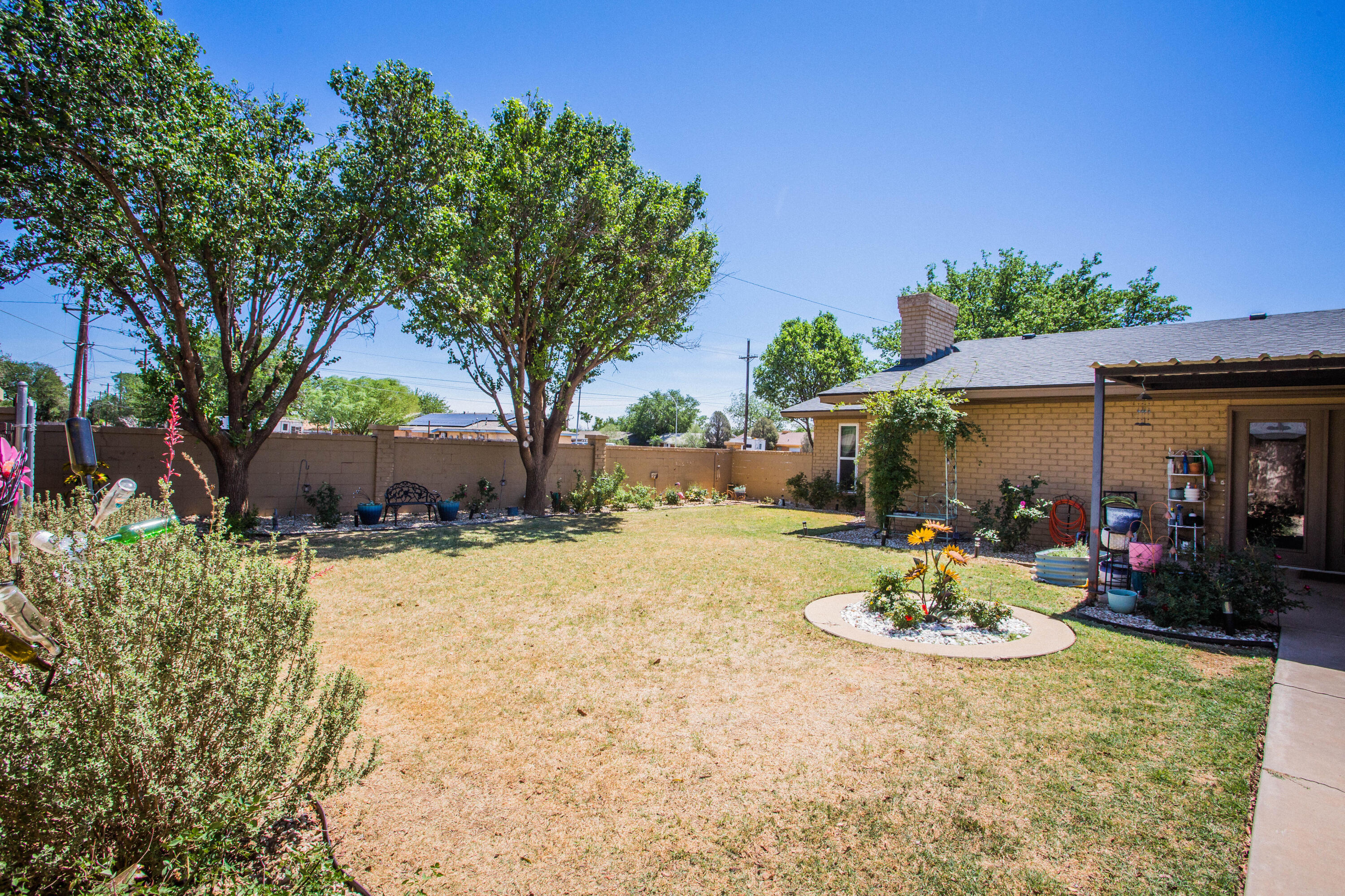 5202 44th Street Lubbock, TX 79414 - Photo 46 of 51 a view of a house with a yard