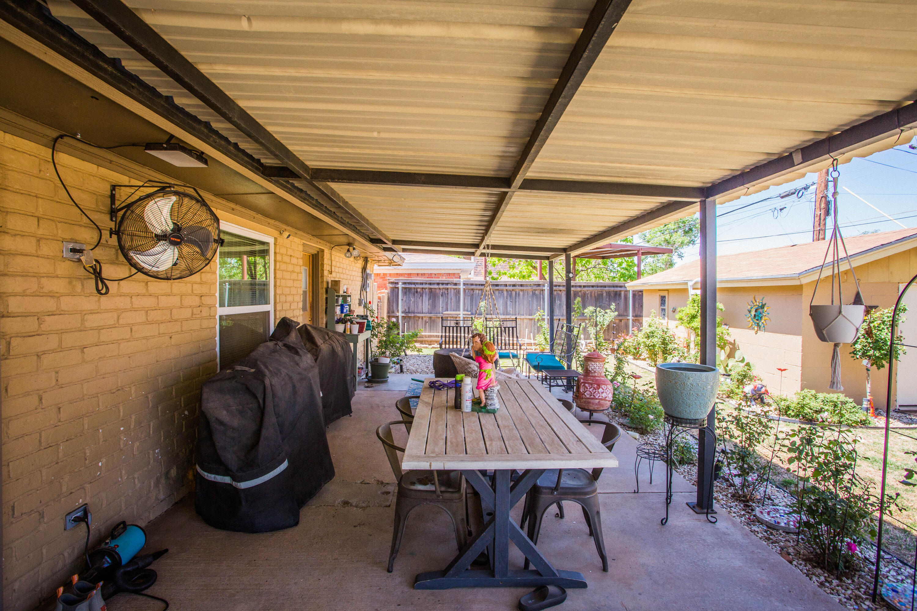 5202 44th Street Lubbock, TX 79414 - Photo 51 of 51 a view of a table and chairs in patio