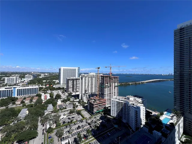 a view of a city with ocean