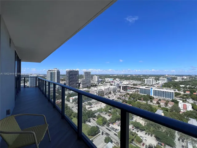 a view of city from a balcony