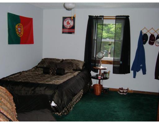 43 Hartness Road Sutton, MA 01590 - Photo 9 of 10 a bedroom with a bed and a window