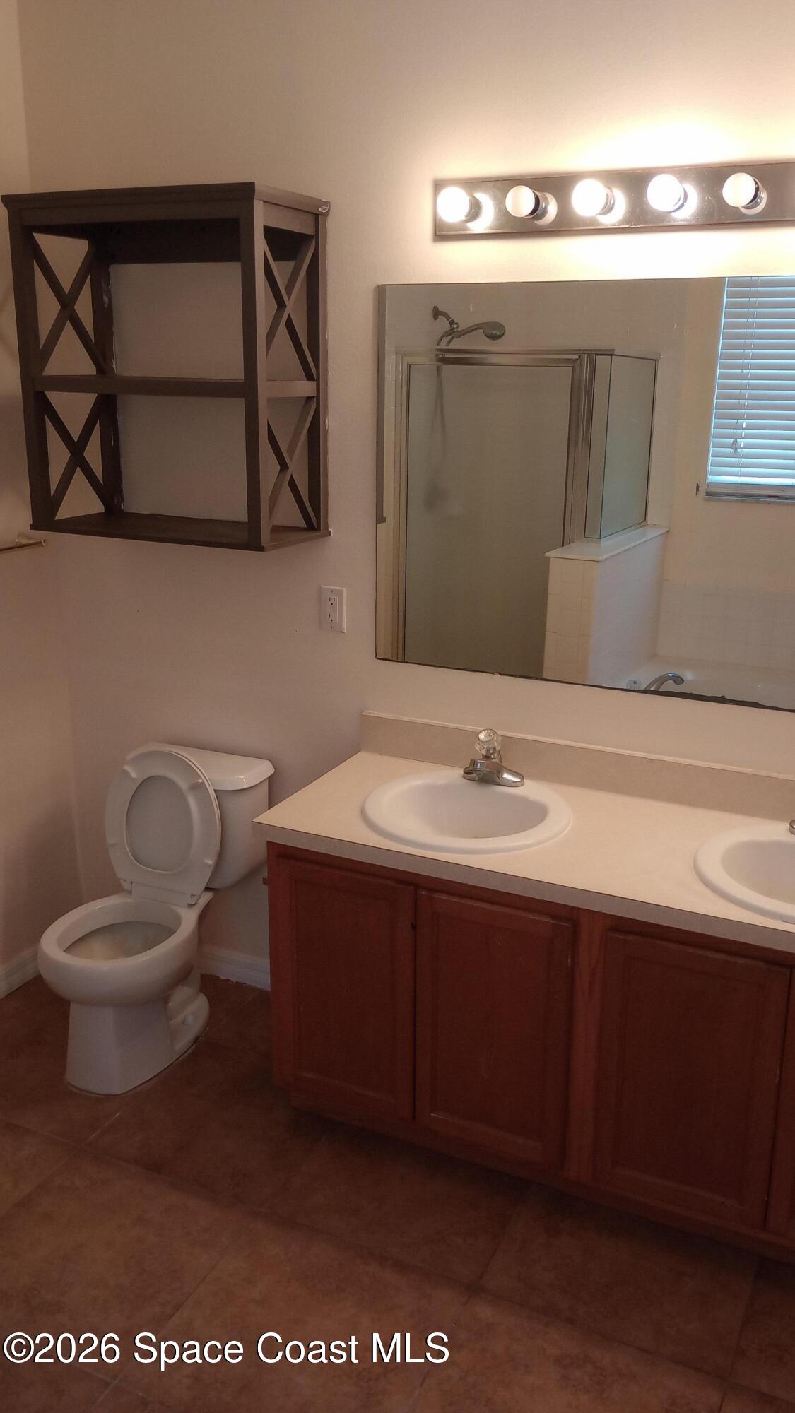 561 Lambert Street Southwest Palm Bay, FL 32908 - Photo 11 of 13 Master Bathroom