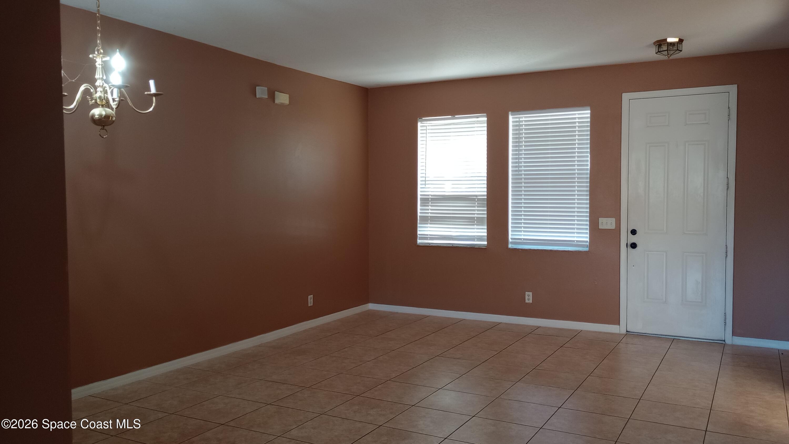 561 Lambert Street Southwest Palm Bay, FL 32908 - Photo 2 of 13 Front living room