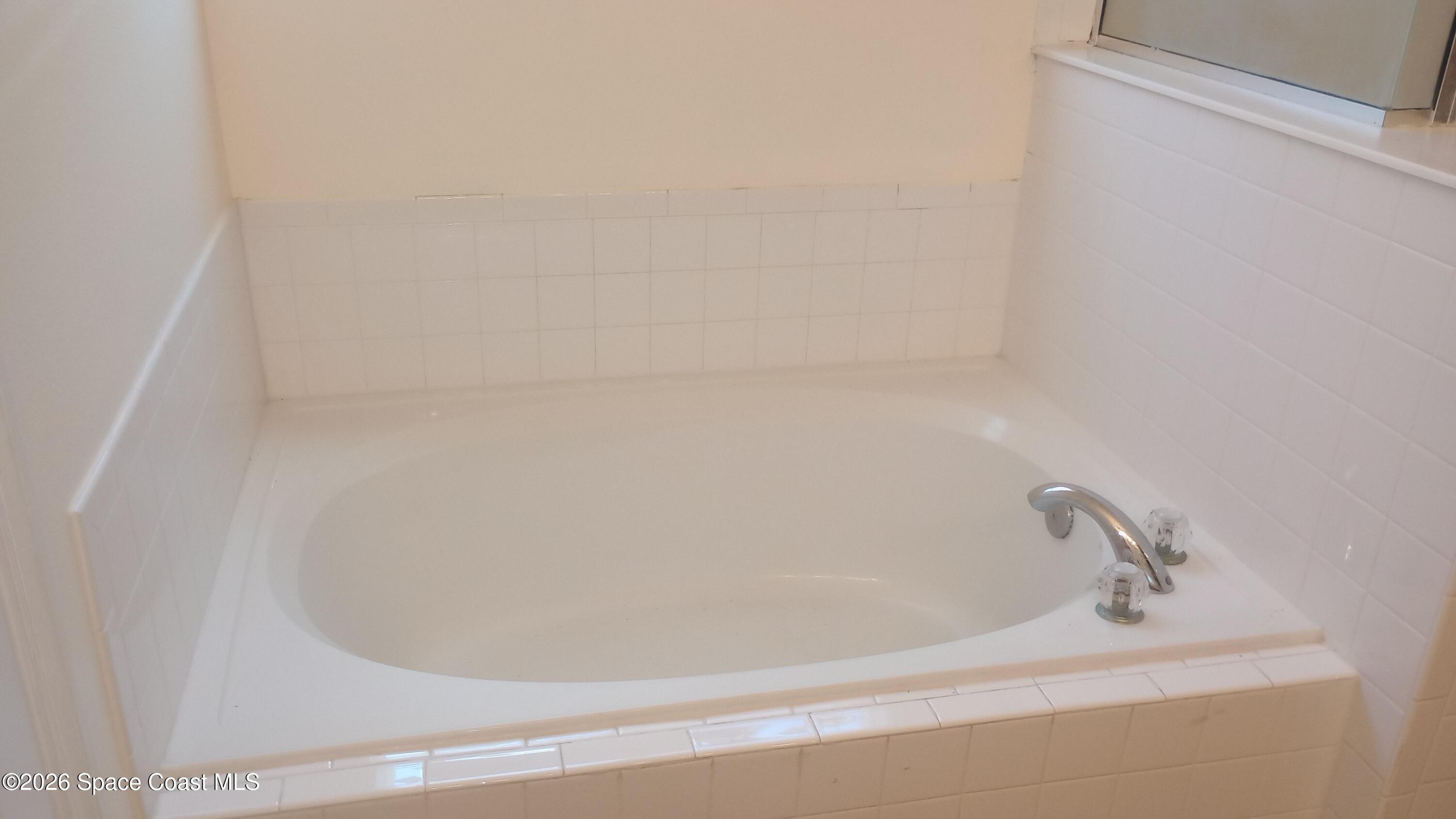 561 Lambert Street Southwest Palm Bay, FL 32908 - Photo 3 of 13 Master Bathroom Soaker tub