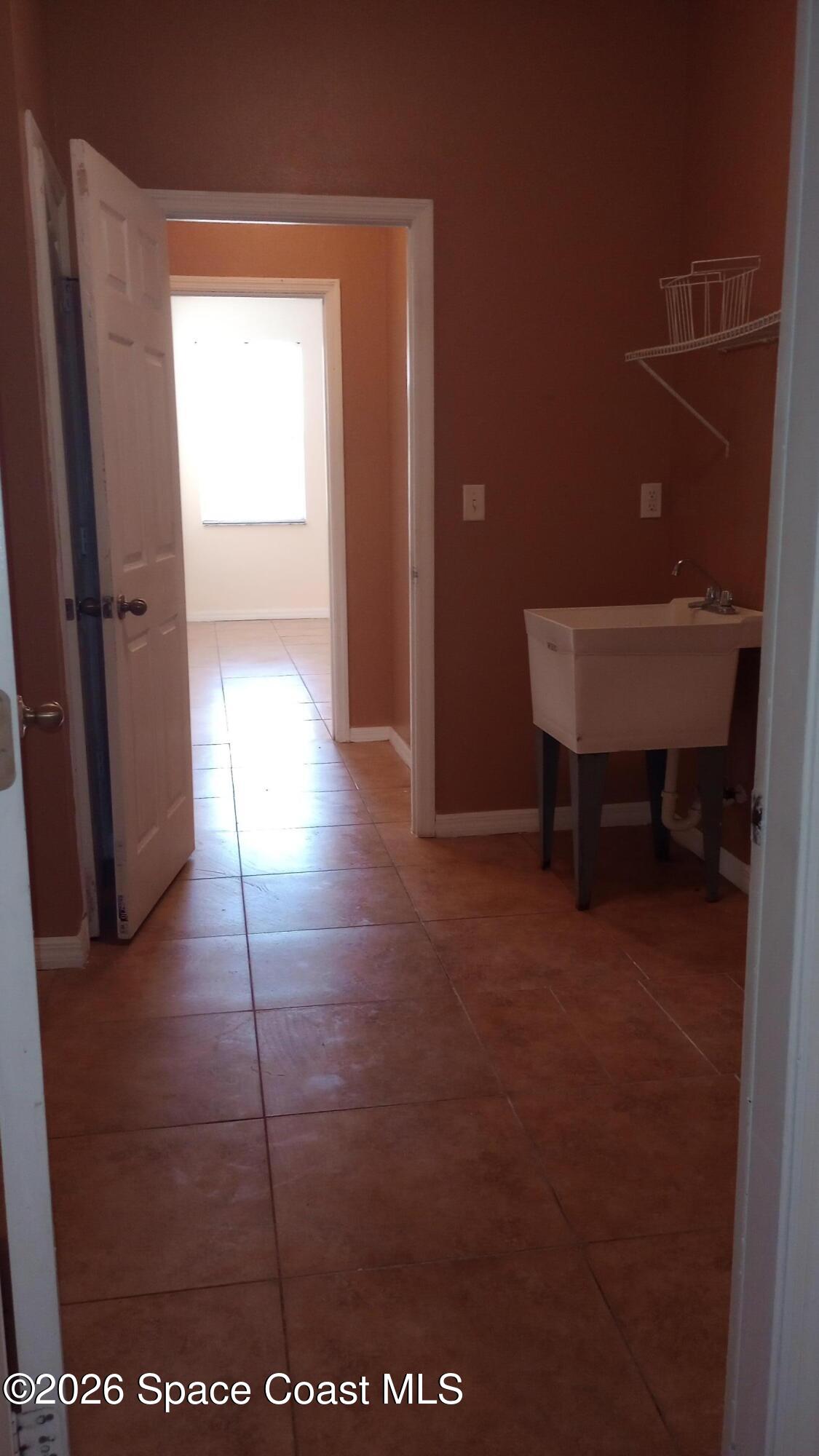 561 Lambert Street Southwest Palm Bay, FL 32908 - Photo 7 of 13 IMG_20260306_163905020