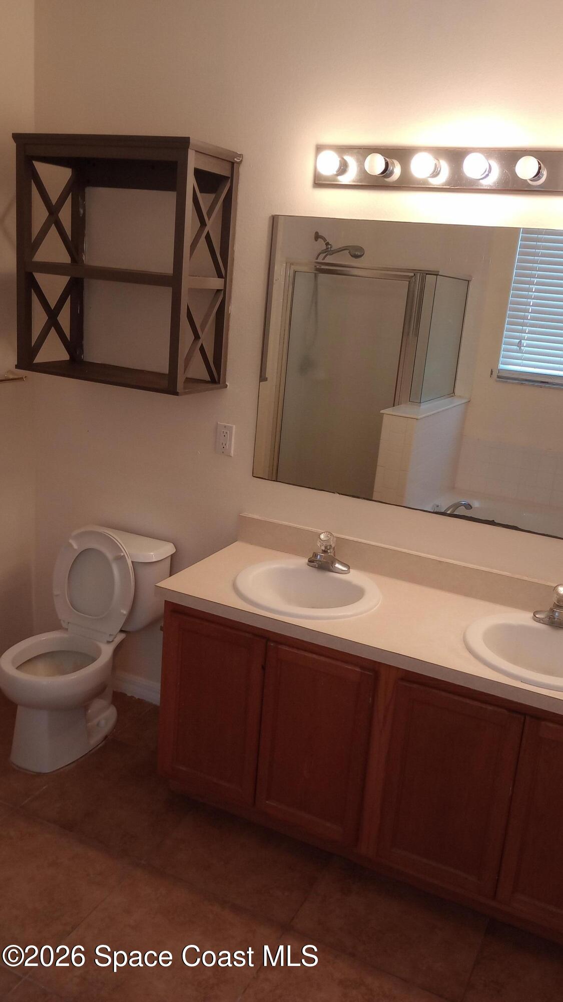 561 Lambert Street Southwest Palm Bay, FL 32908 - Photo 8 of 13 IMG_20260306_163519185