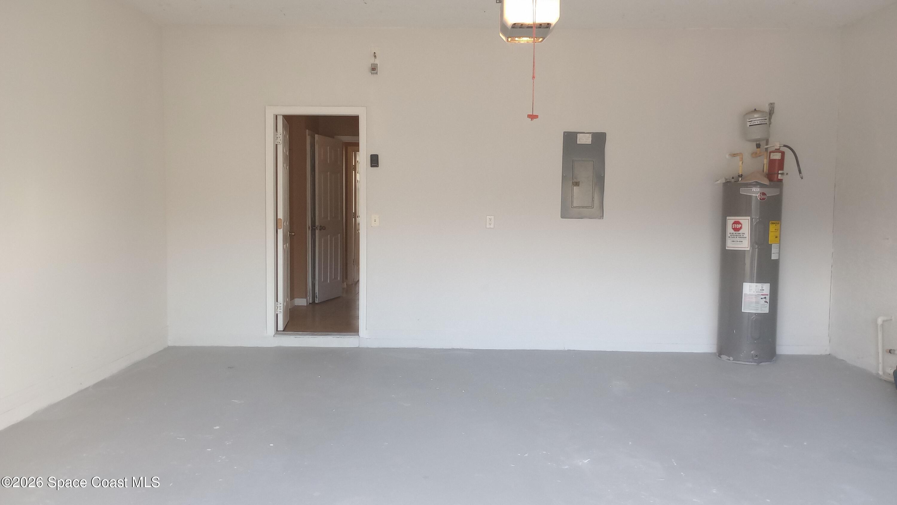 561 Lambert Street Southwest Palm Bay, FL 32908 - Photo 10 of 13 A nice large garage