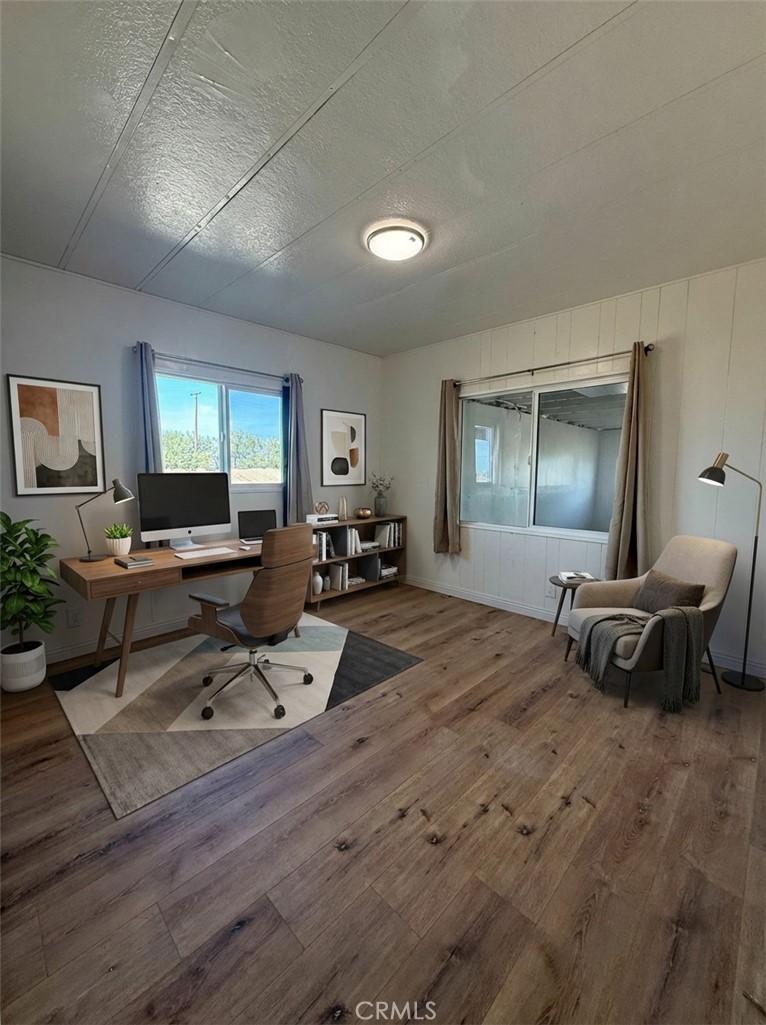 32883 Newberry Road Newberry Springs, CA 92365 - Photo 4 of 14 a living room with furniture and a wooden floor