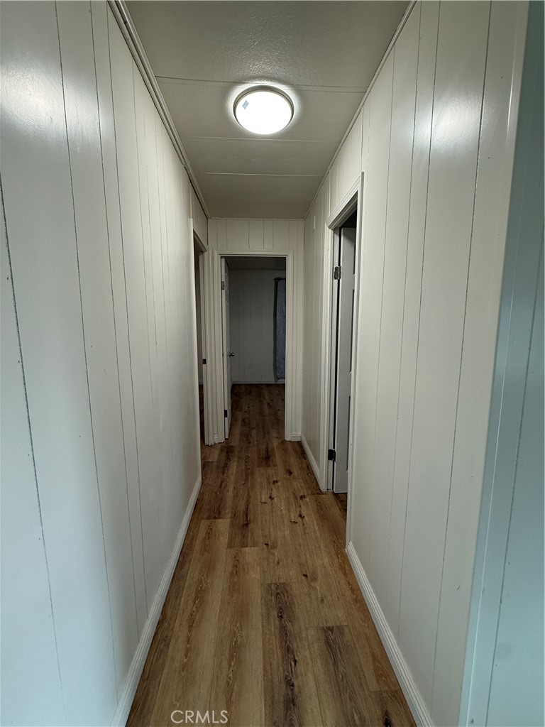 32883 Newberry Road Newberry Springs, CA 92365 - Photo 7 of 14 a view of a hallway with wooden floor